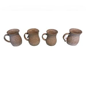 Handmade set of 4 beige rustic leaf pottery mugs